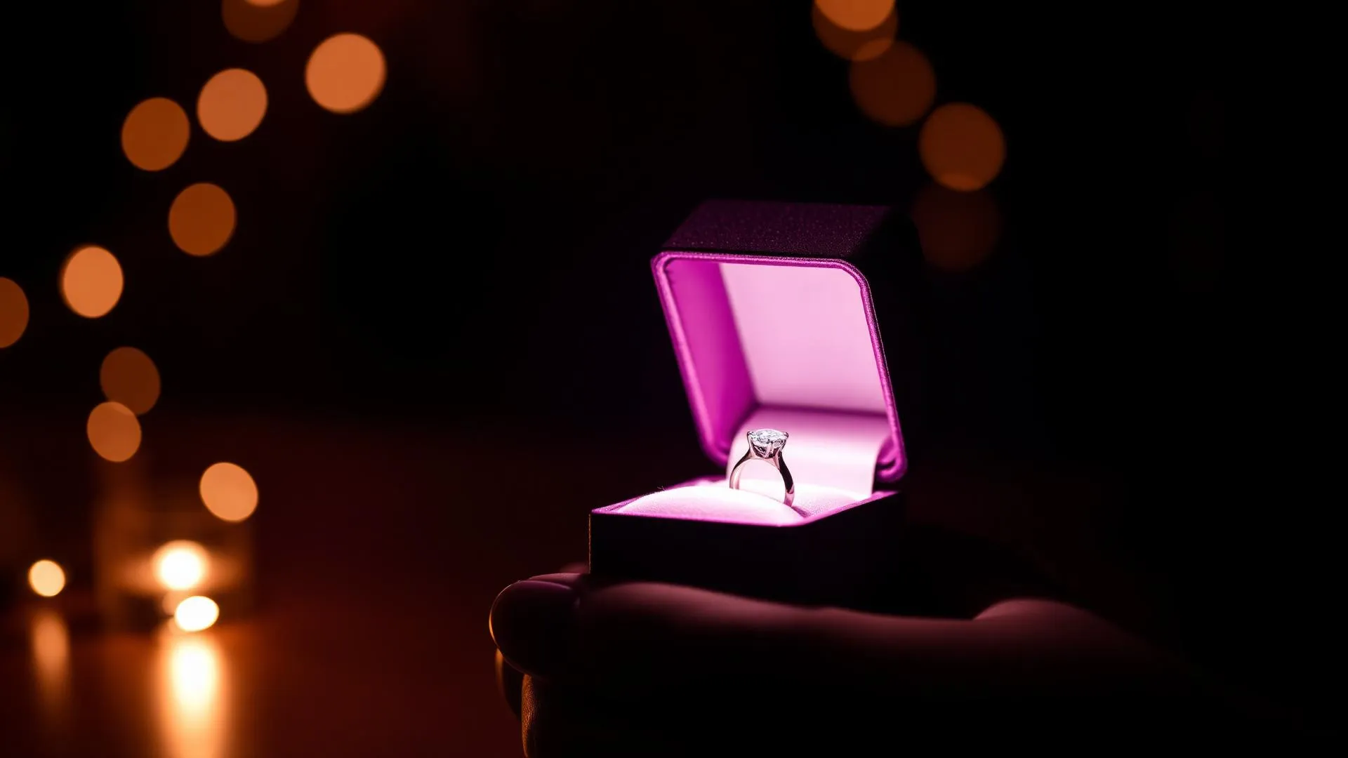 A ring box held open in soft evening light.